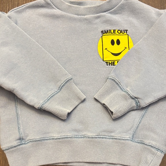 Hundred Pieces Blue Sweatshirt with Yellow Smile Patch - Picture 12 of 12